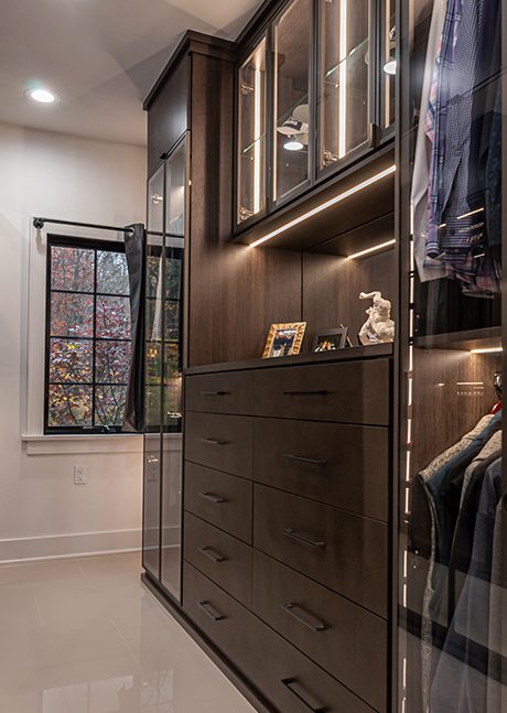 Custom dark brown multi-space cabinet | California Closets