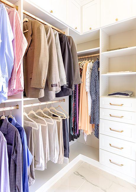 Custom walk-in closet with multiple spaces for storage | California Closets