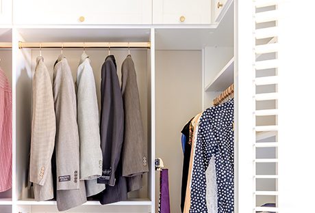 Custom wardrobe space with jackets | California Closets