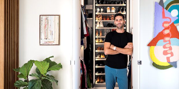 Nev Schulman standing in front of custom closet with a custom shoe rack | California Closets