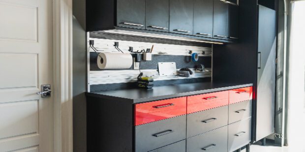 Custom garage storage showing a black tool cabinet