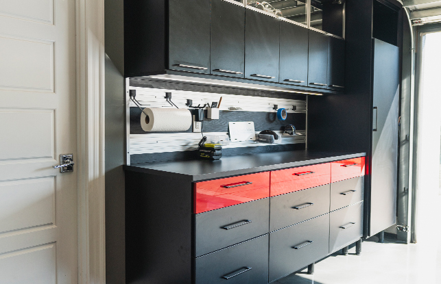 Custom garage storage showing a black tool cabinet