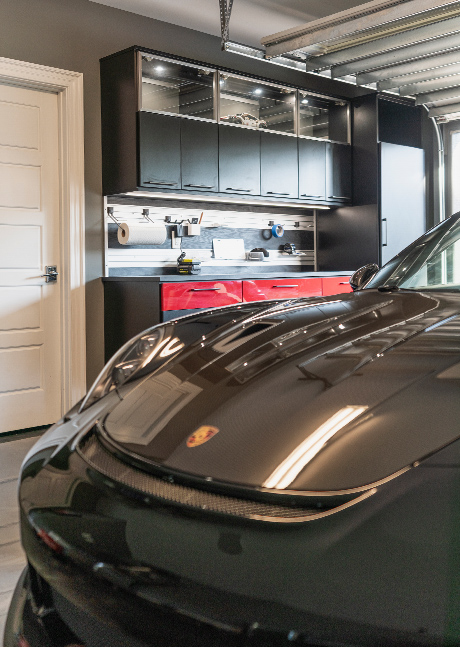 Custom garage tool's cabinet and a black Porsche