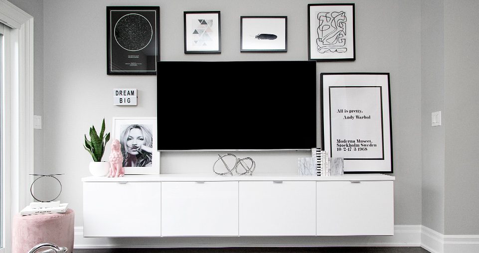 Built in media center in white shown in a white finish by California Closets