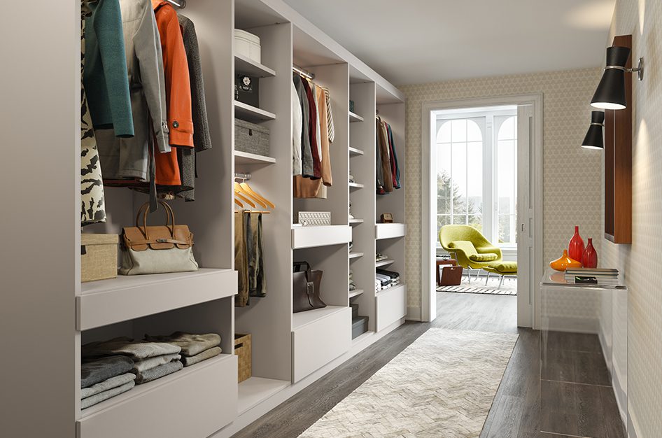 Wardrobe closet with a light neutral matte finish created and designed by California Closets.
