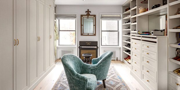 Jon Batiste Suleika Jaouad's custom walk in closet with a white linen finish and dual wardrobe design