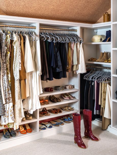 Sarah Flint's reimagined walk in closet with corner wrap storage, shoe shelves and custom wardrobe organization designed by California Closets