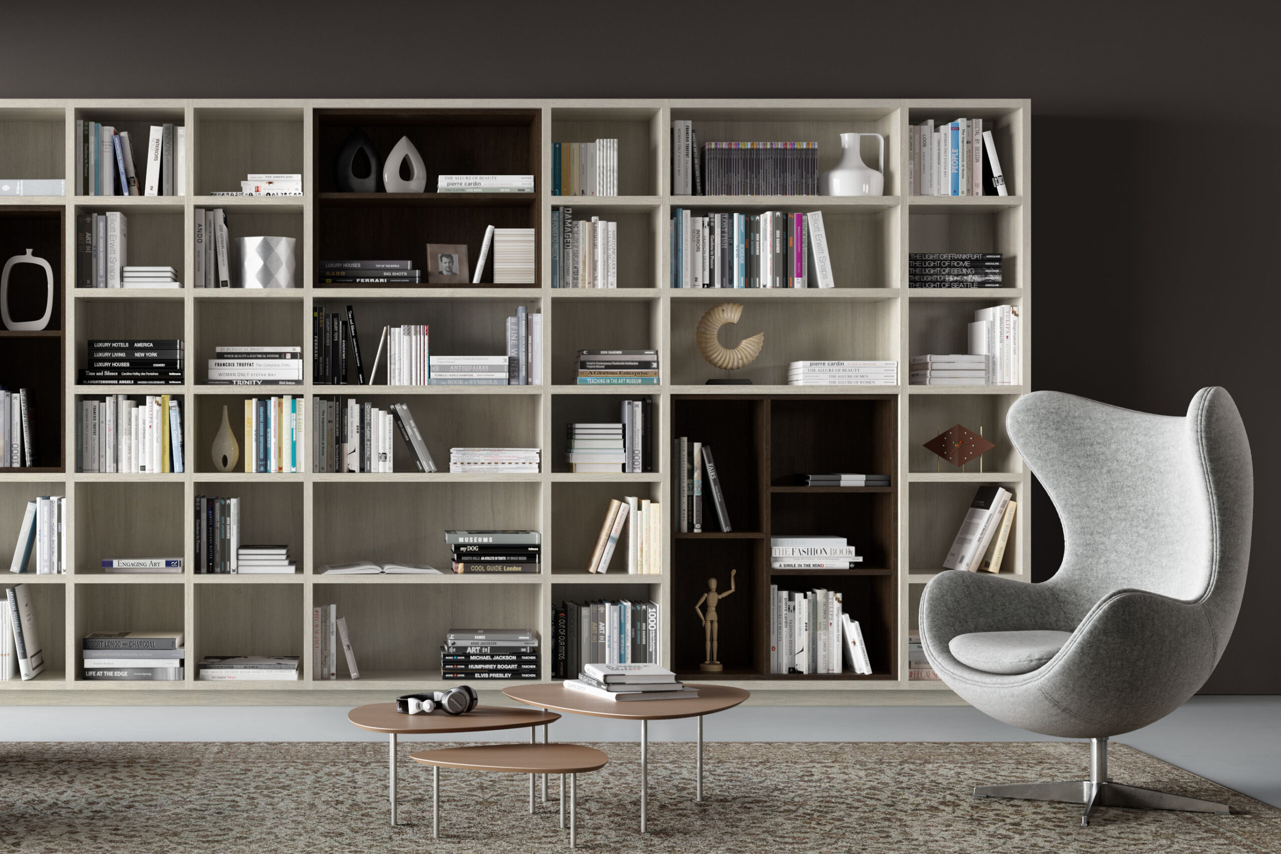 Modern home library design with custom built in bookcases in white wood finish by California Closets